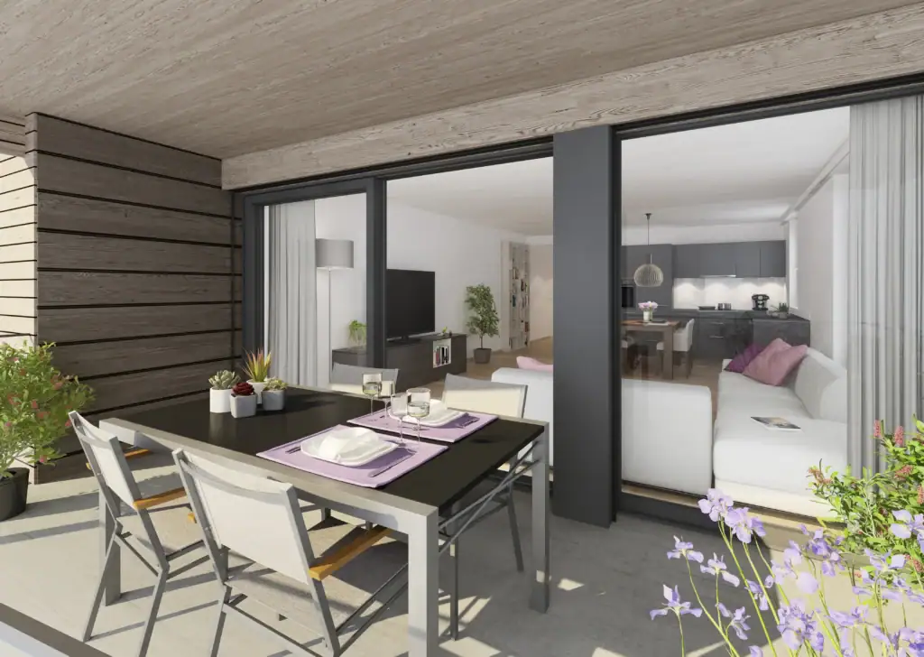 Der gedeckte Balkon bietet zusätzlichen Wohnraum im Freien und schafft eine angenehme Verbindung zwischen Innen- und Aussenbereich.